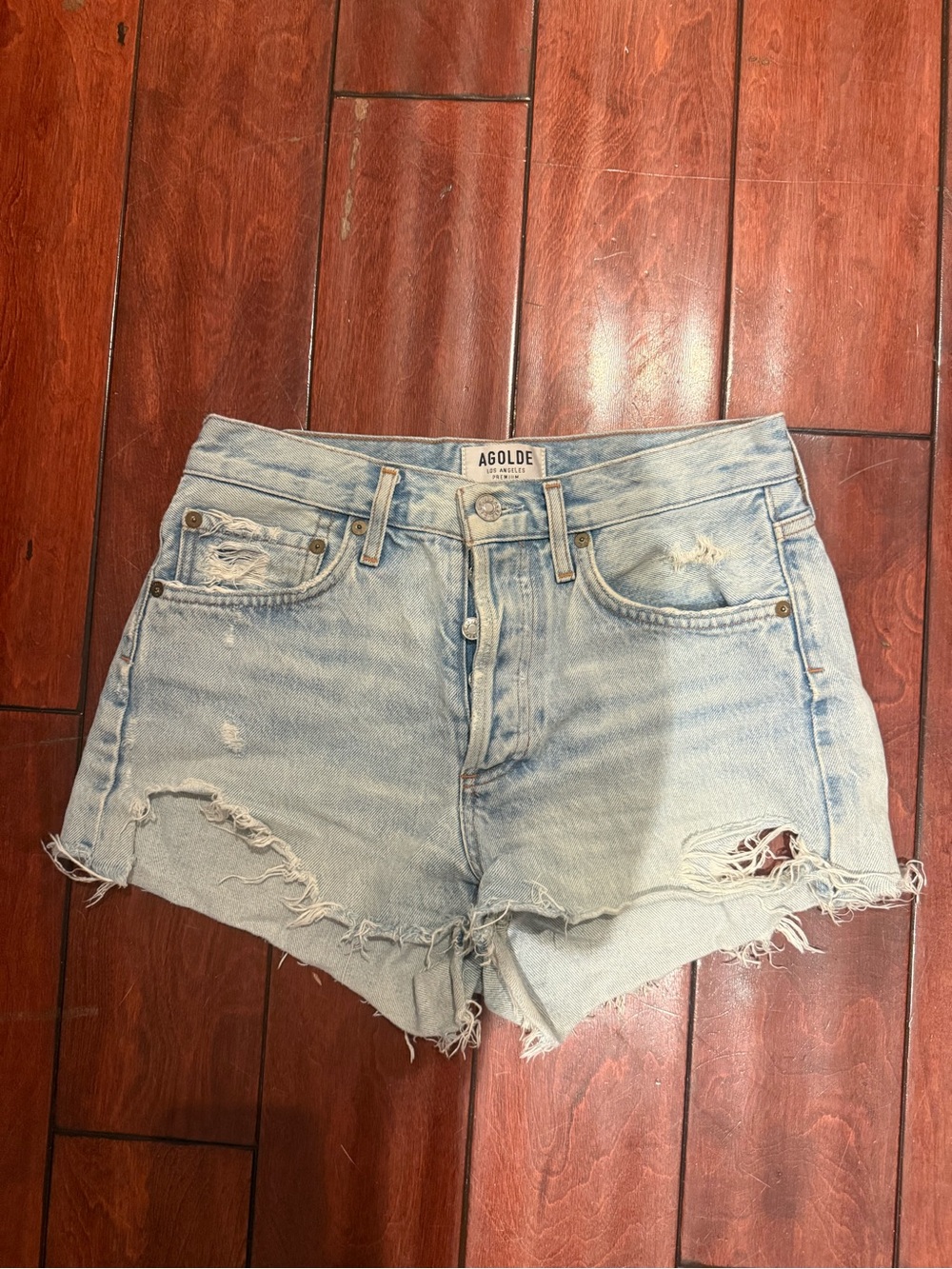 Agolde Light Wash Distressed Denim Cutoff Shorts